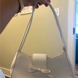 Elegant white Handbag with Bow Accent